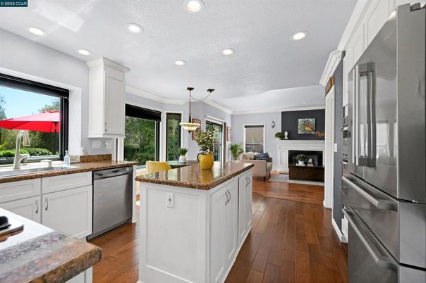 Fireplace, Interior, Kitchen, Pendant Lights, Recessed Lighting, Stainless Steel Appliances, Wood Texture Flooring