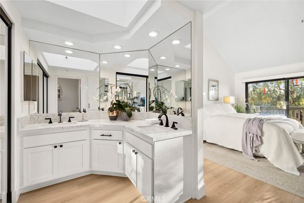 Bathroom, Bedroom, Dual Sink Vanities, Interior, Recessed Lighting, Wood Texture Flooring