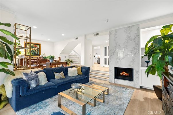 Dining room, Fireplace, Interior, Living room, Recessed Lighting, Wood Texture Flooring