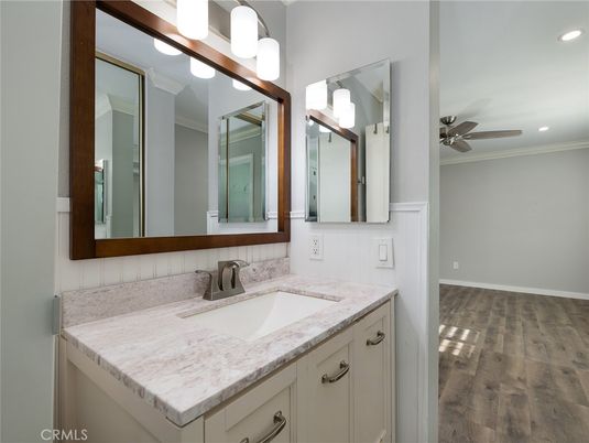 Bathroom, Dual Sink Vanities, Interior, Recessed Lighting, Wood Texture Flooring