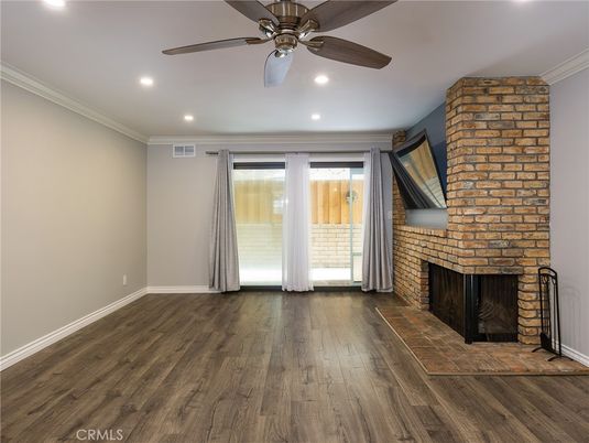 Empty room, Fireplace, Interior, Recessed Lighting, Stone Walls, Wood Texture Flooring
