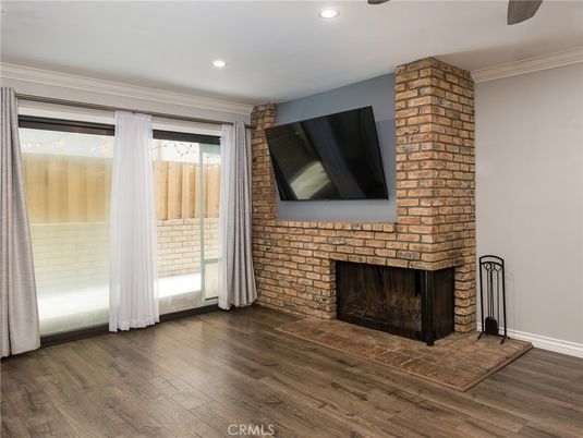 Empty room, Fireplace, Interior, Recessed Lighting, Stone Walls, Wood Texture Flooring
