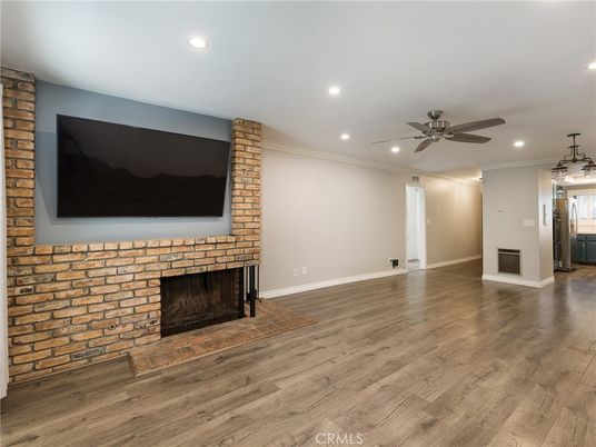 Empty room, Fireplace, Interior, Pendant Lights, Recessed Lighting, Stone Walls, Wood Texture Flooring