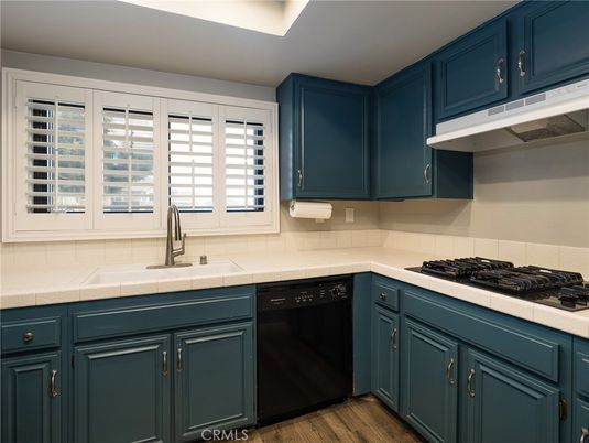 Interior, Kitchen, Tile Countertops, Wood Texture Flooring