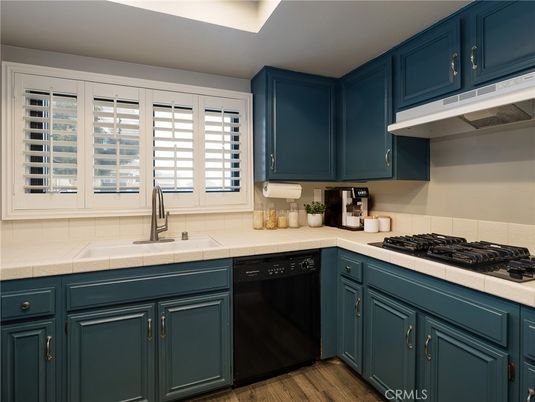 Interior, Kitchen, Tile Countertops, Wood Texture Flooring