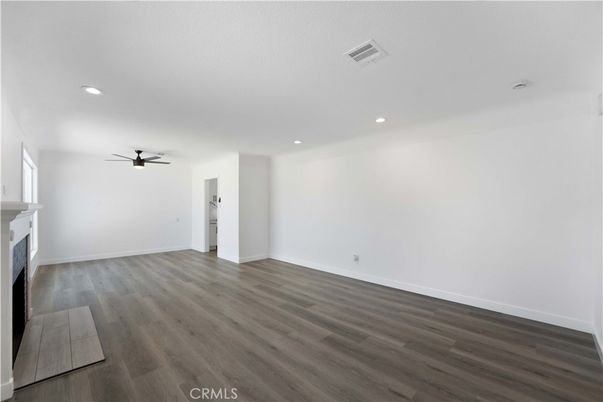 Empty room, Fireplace, Interior, Recessed Lighting, Wood Texture Flooring