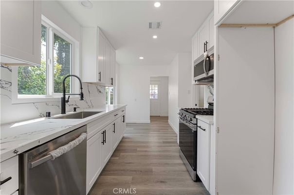 Interior, Kitchen, Recessed Lighting, Stainless Steel Appliances, Wood Texture Flooring