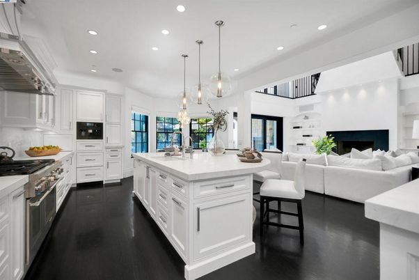 Fireplace, Interior, Kitchen, Living room, Pendant Lights, Recessed Lighting, Stainless Steel Appliances, Wood Texture Flooring