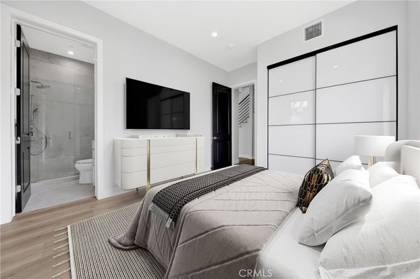 Bathroom, Bedroom, Glass Shower, Interior, Recessed Lighting, Wood Texture Flooring