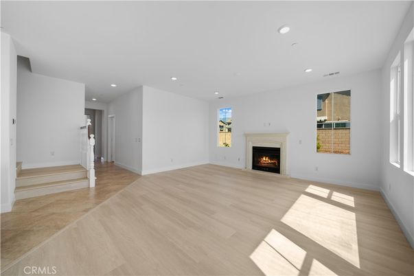 Empty room, Fireplace, Interior, Recessed Lighting, Wood Texture Flooring