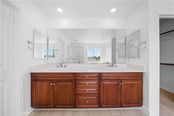 Bathroom, Dual Sink Vanities, Interior, Recessed Lighting, Wood Texture Flooring
