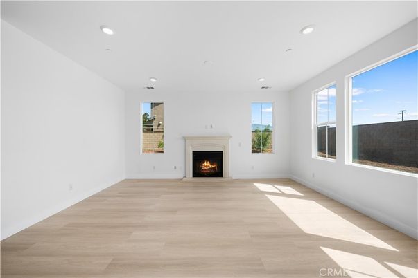 Empty room, Fireplace, Interior, Recessed Lighting, Wood Texture Flooring