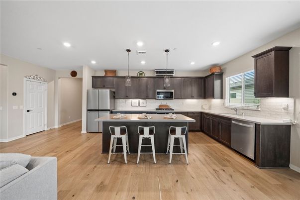 Interior, Kitchen, Pendant Lights, Recessed Lighting, Stainless Steel Appliances, Wood Texture Flooring