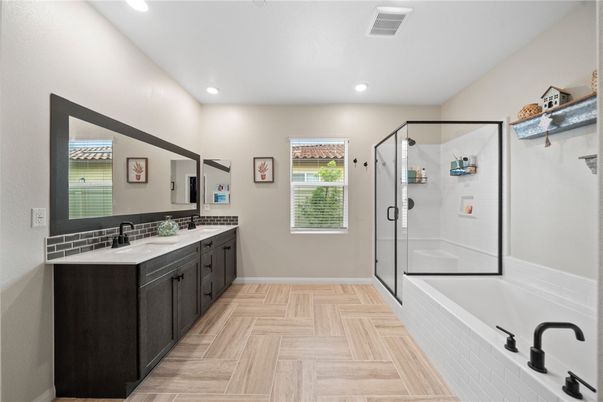 Bathroom, Dual Sink Vanities, Glass Shower, Interior, Recessed Lighting, Wood Texture Flooring