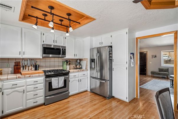 Interior, Kitchen, Pendant Lights, Stainless Steel Appliances, Wood Texture Flooring