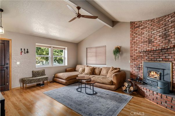 Fireplace, Interior, Living room, Pendant Lights, Stone Walls, Wood Texture Flooring