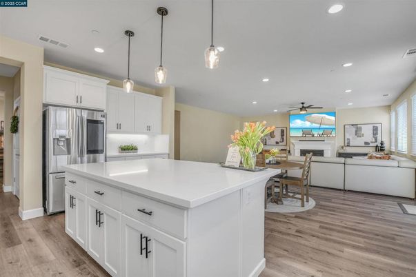 Dining room, Interior, Kitchen, Living room, Pendant Lights, Recessed Lighting, Stainless Steel Appliances, Wood Texture Flooring