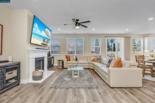 Dining room, Fireplace, Interior, Living room, Recessed Lighting, Wood Texture Flooring
