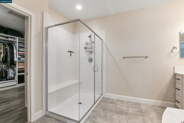 Bathroom, Glass Shower, Interior, Recessed Lighting, Walk-in Closets, Wood Texture Flooring
