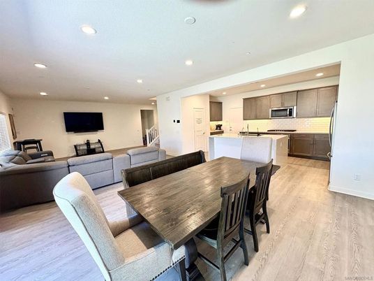 Dining room, Interior, Kitchen, Living room, Recessed Lighting, Stainless Steel Appliances, Wood Texture Flooring