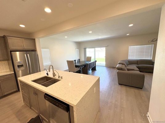 Dining room, Interior, Kitchen, Living room, Recessed Lighting, Stainless Steel Appliances, Wood Texture Flooring