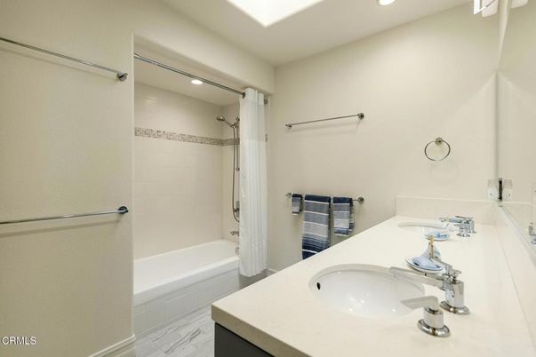 Bathroom, Dual Sink Vanities, Interior, Recessed Lighting, Wood Texture Flooring
