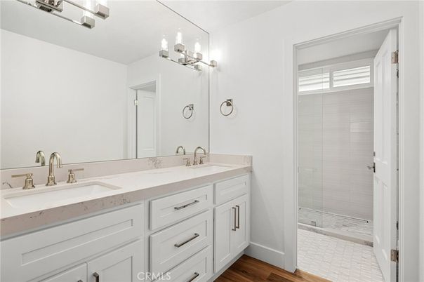 Bathroom, Dual Sink Vanities, Glass Shower, Interior, Wood Texture Flooring