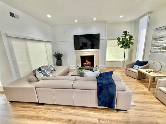 Fireplace, Interior, Living room, Recessed Lighting, Wood Texture Flooring