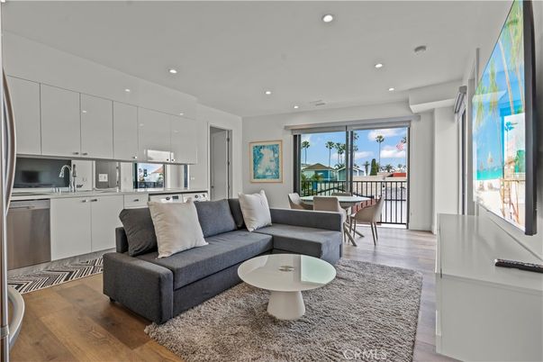 Dining room, Interior, Kitchen, Living room, Recessed Lighting, Stainless Steel Appliances, Wood Texture Flooring