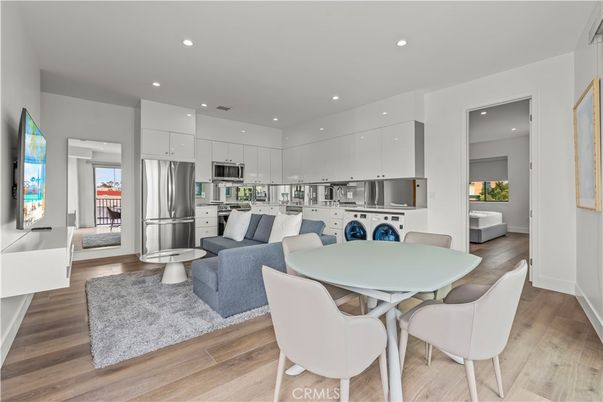 Dining room, Interior, Kitchen, Living room, Recessed Lighting, Stainless Steel Appliances, Wood Texture Flooring