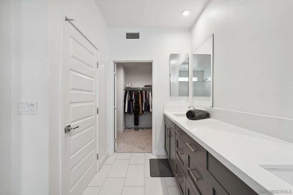 Bathroom, Dual Sink Vanities, Interior, Recessed Lighting, Walk-in Closets