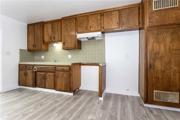 Interior, Kitchen, Tile Countertops, Wood Texture Flooring