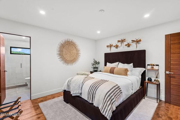 Bathroom, Bedroom, Glass Shower, Interior, Recessed Lighting, Wood Texture Flooring