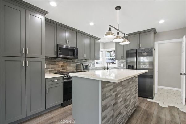 Interior, Kitchen, Pendant Lights, Recessed Lighting, Stainless Steel Appliances, Wood Texture Flooring