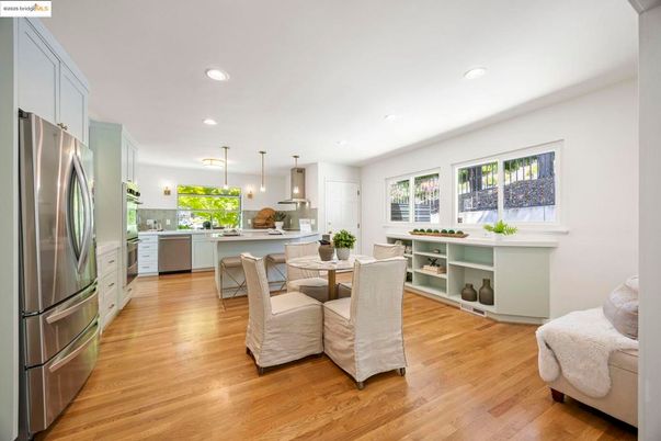 Dining room, Interior, Kitchen, Pendant Lights, Recessed Lighting, Stainless Steel Appliances, Wood Texture Flooring