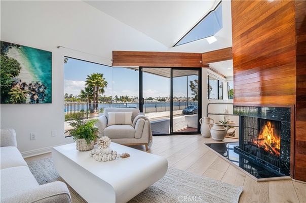 Fireplace, Interior, Living room, Recessed Lighting, Water, Wood Texture Flooring, Wooden Walls