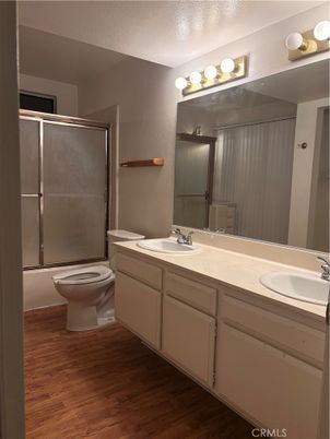 Bathroom, Dual Sink Vanities, Glass Shower, Interior, Wood Texture Flooring