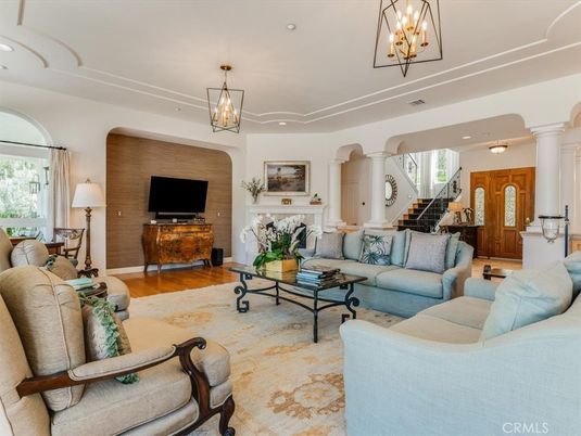 Chandelier, Fireplace, Interior, Living room, Recessed Lighting, Wood Texture Flooring