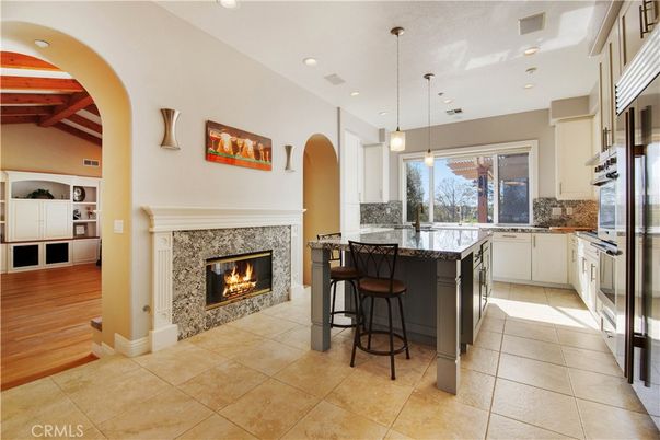 Fireplace, Interior, Kitchen, Pendant Lights, Recessed Lighting, Stainless Steel Appliances, Wooden Beams