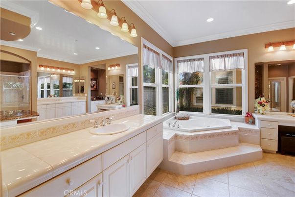 Bathroom, Dual Sink Vanities, Glass Shower, Interior, Recessed Lighting, Tile Countertops