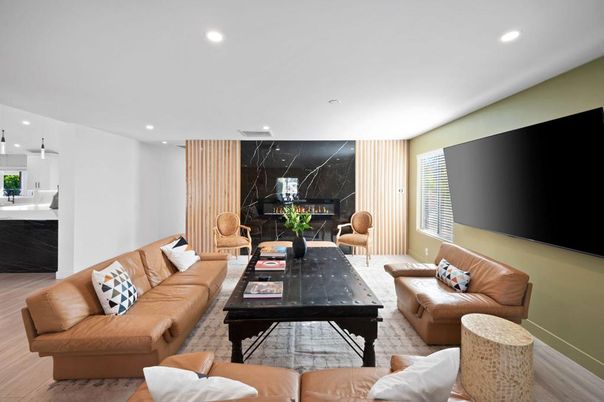 Fireplace, Interior, Living room, Marble Walls, Pendant Lights, Recessed Lighting, Wood Texture Flooring