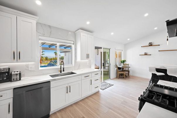 Dining room, Interior, Kitchen, Marble Walls, Recessed Lighting, Stainless Steel Appliances, Wood Texture Flooring