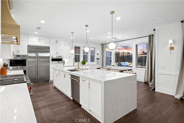 Interior, Kitchen, Pendant Lights, Recessed Lighting, Stainless Steel Appliances, Wood Texture Flooring
