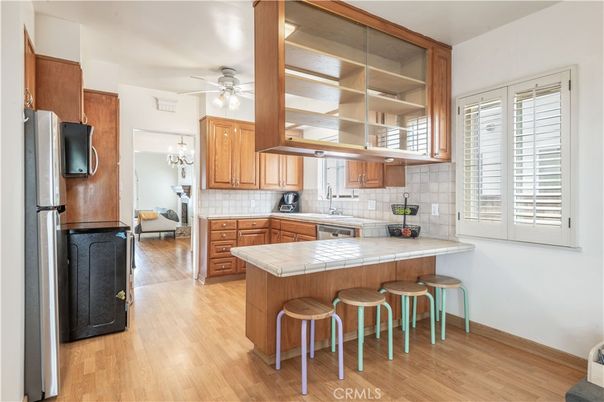 Chandelier, Interior, Kitchen, Tile Countertops, Wood Texture Flooring