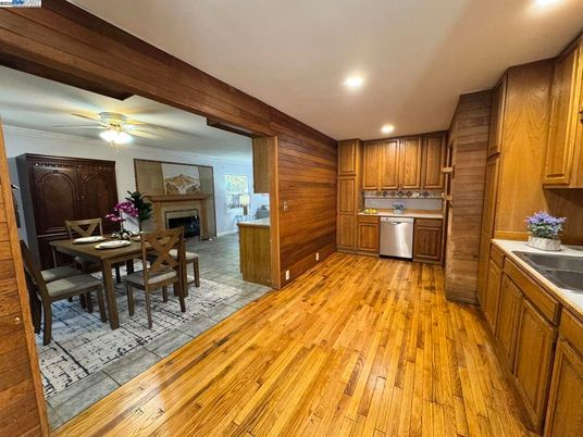 Dining room, Fireplace, Interior, Kitchen, Recessed Lighting, Wood Texture Flooring