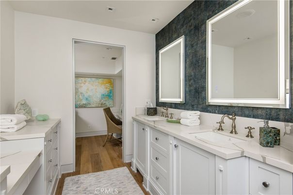 Bathroom, Dual Sink Vanities, Interior, Recessed Lighting, Wood Texture Flooring