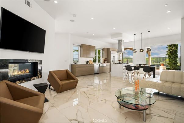 Dining room, Fireplace, Interior, Living room, Marble, Pendant Lights, Recessed Lighting