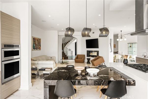 Fireplace, Interior, Kitchen, Living room, Marble, Pendant Lights, Recessed Lighting, Stainless Steel Appliances