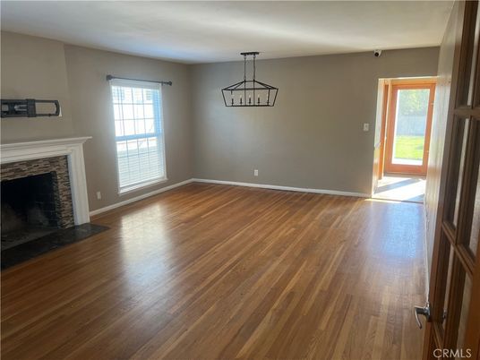 Empty room, Fireplace, Interior, Pendant Lights, Wood Texture Flooring
