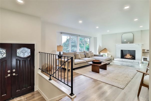 Fireplace, Interior, Living room, Recessed Lighting, Wood Texture Flooring